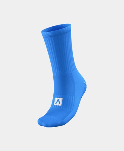 Reflective Mid-Calf Football Grip Socks on the pitch, showcasing the balance of comfort and performance.