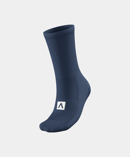 Reflective Mid-Calf Football Grip Socks showing compression zones for added stability and performance.